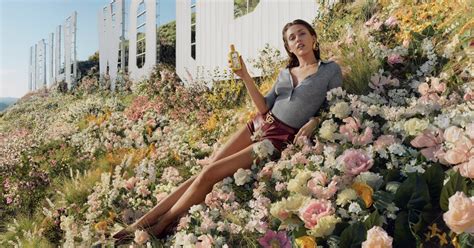 is miley cyrus in a versace perfume commercial